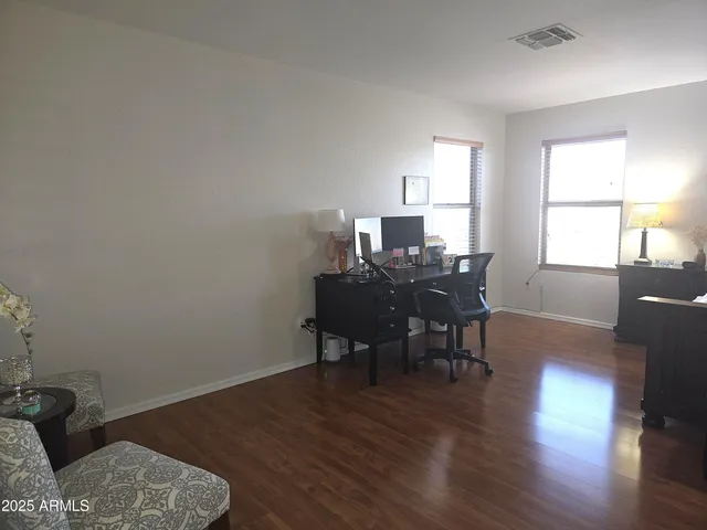 a bathroom with a toilet a sink and a shower