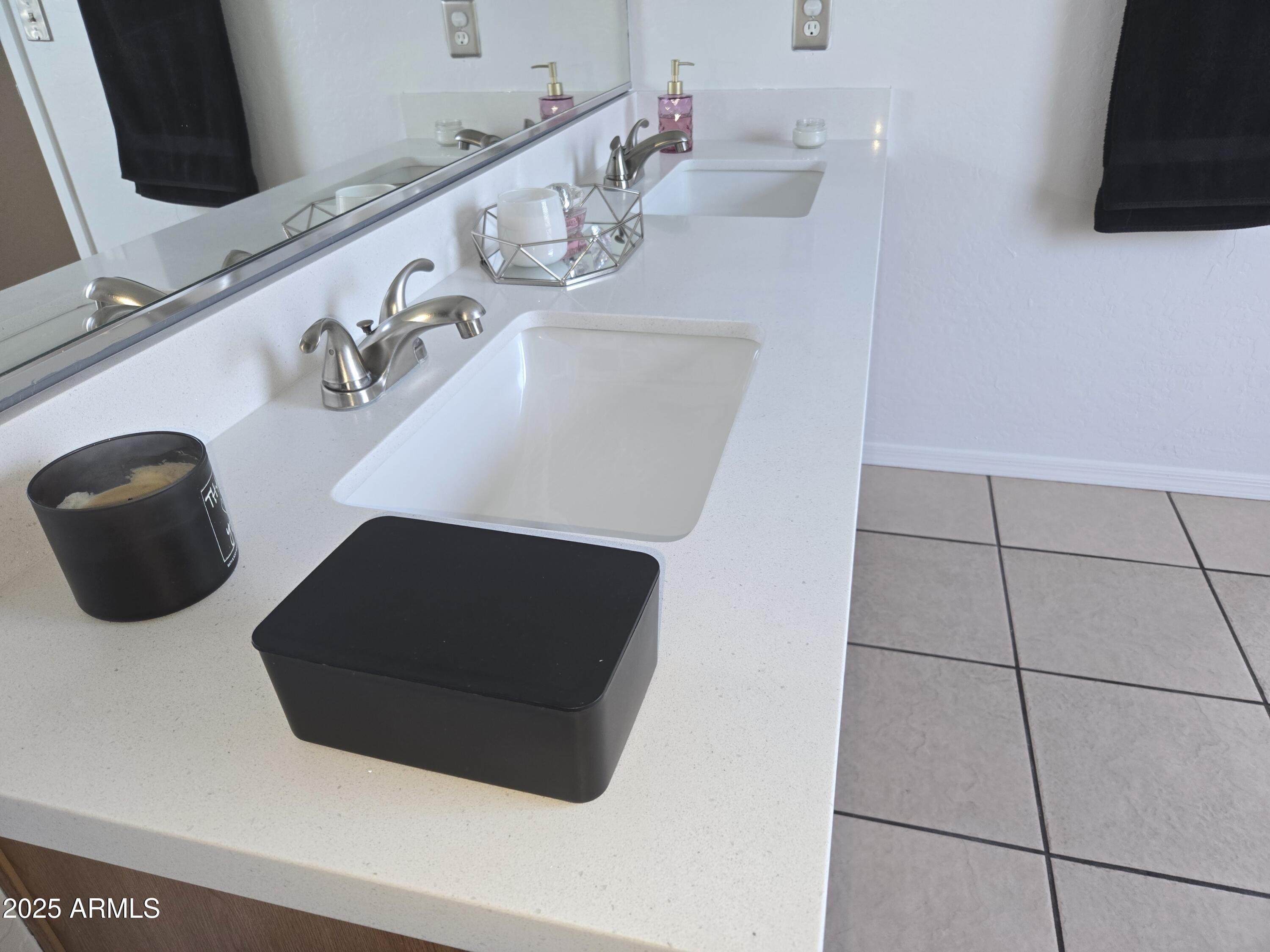3283 South Conestoga Road Apache Junction, AZ 85119 - Photo 20 of 32 a bathroom with a sink and a mirror