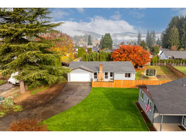 a view of a house with a big yard