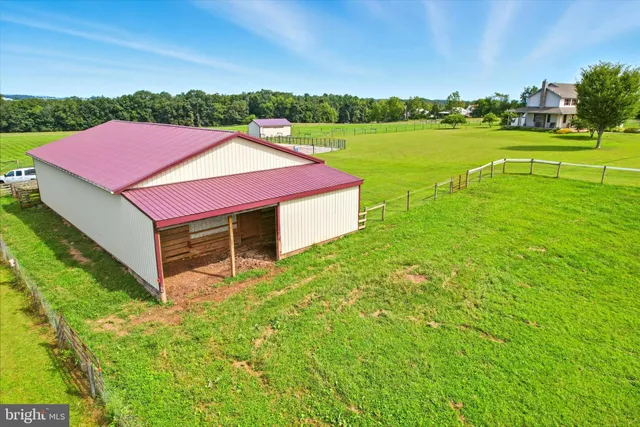 a view of a backyard of a house