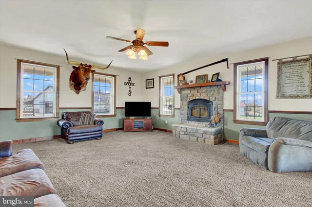 a view of a dining room with furniture wooden floor and chandelier