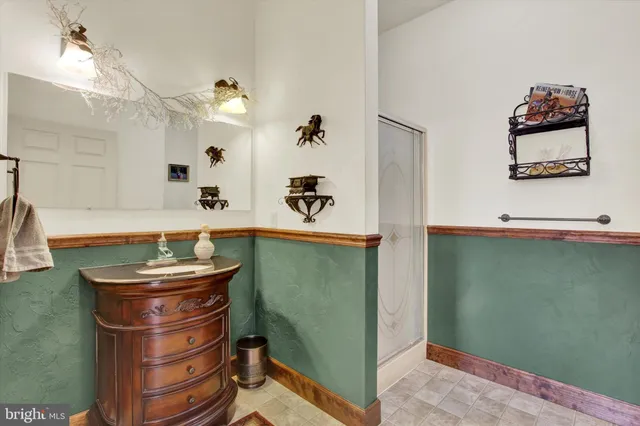 a bedroom with bed and a window