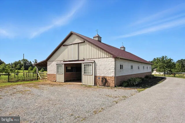 a view of a porch with wooden stairs
