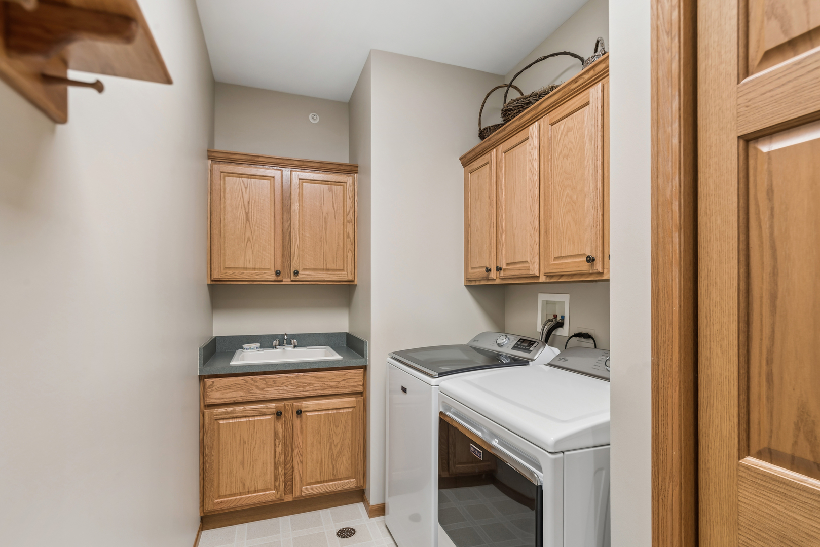 10907 Red Hawk Lane Spring Grove, IL 60071 - Photo 25 of 44 a utility room with washer and dryer