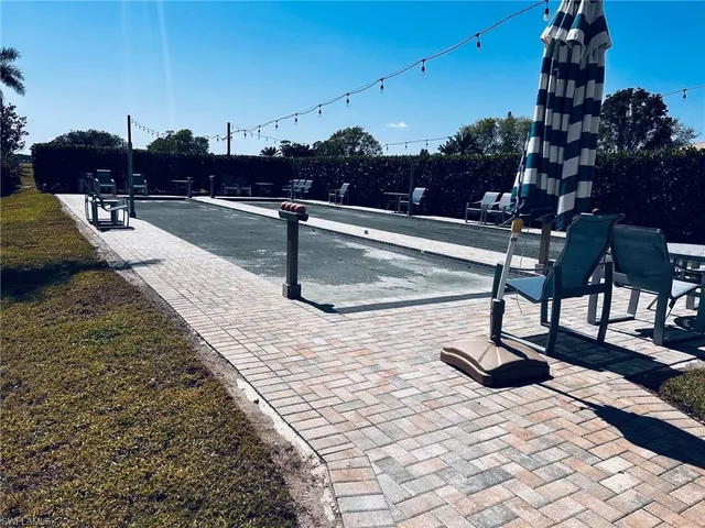 a room with furniture and a large window