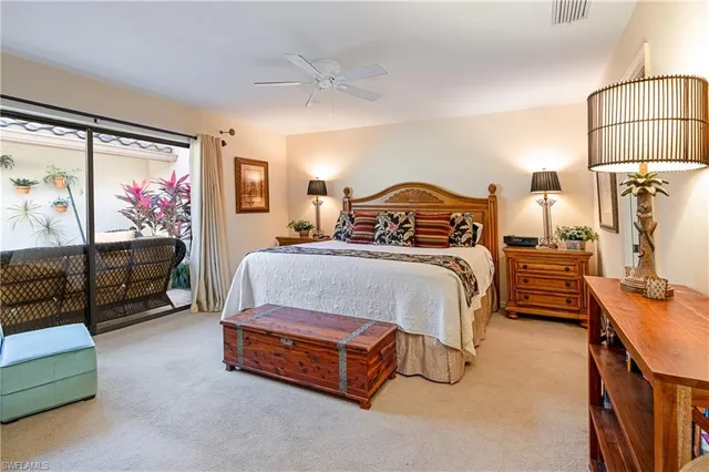 a bedroom with a bed and a walk in closet