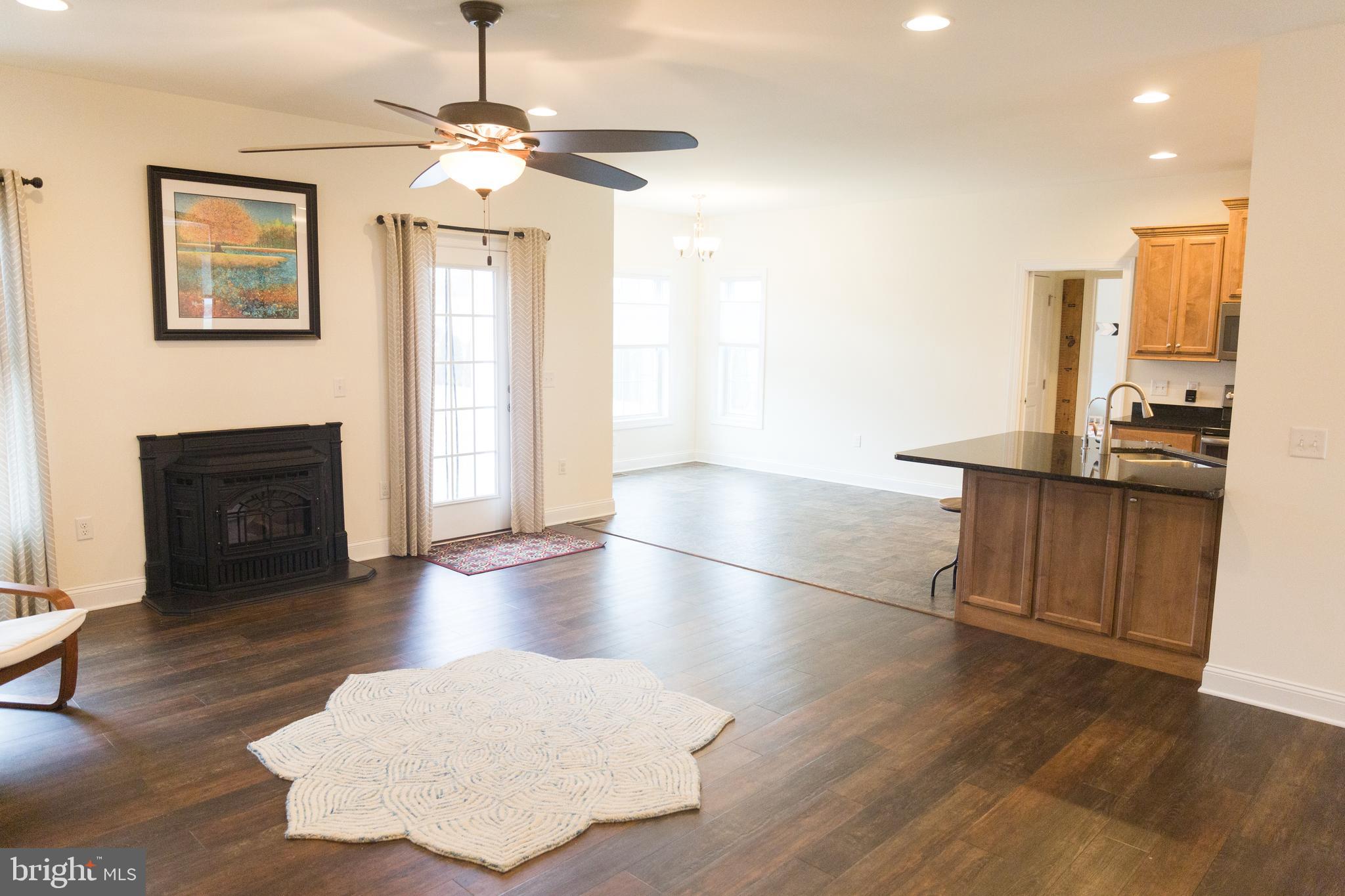 36386 Robin Hood Road Delmar, DE 19940 - Photo 7 of 24 Pellet Stove, Manington wood floors