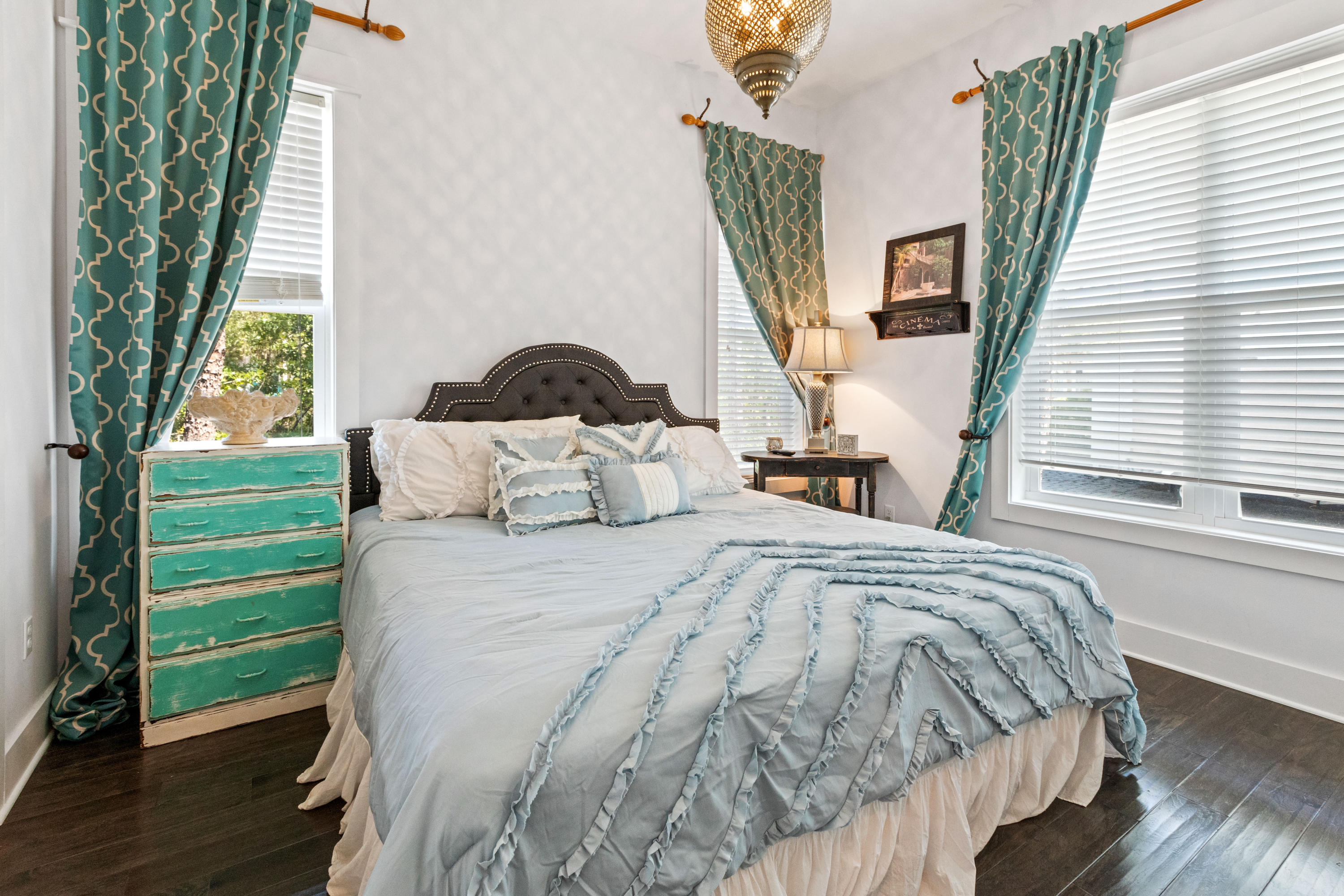 18 Hiker Street Santa Rosa Beach, FL 32459 - Photo 13 of 39 a bedroom with a bed a mirror and a window