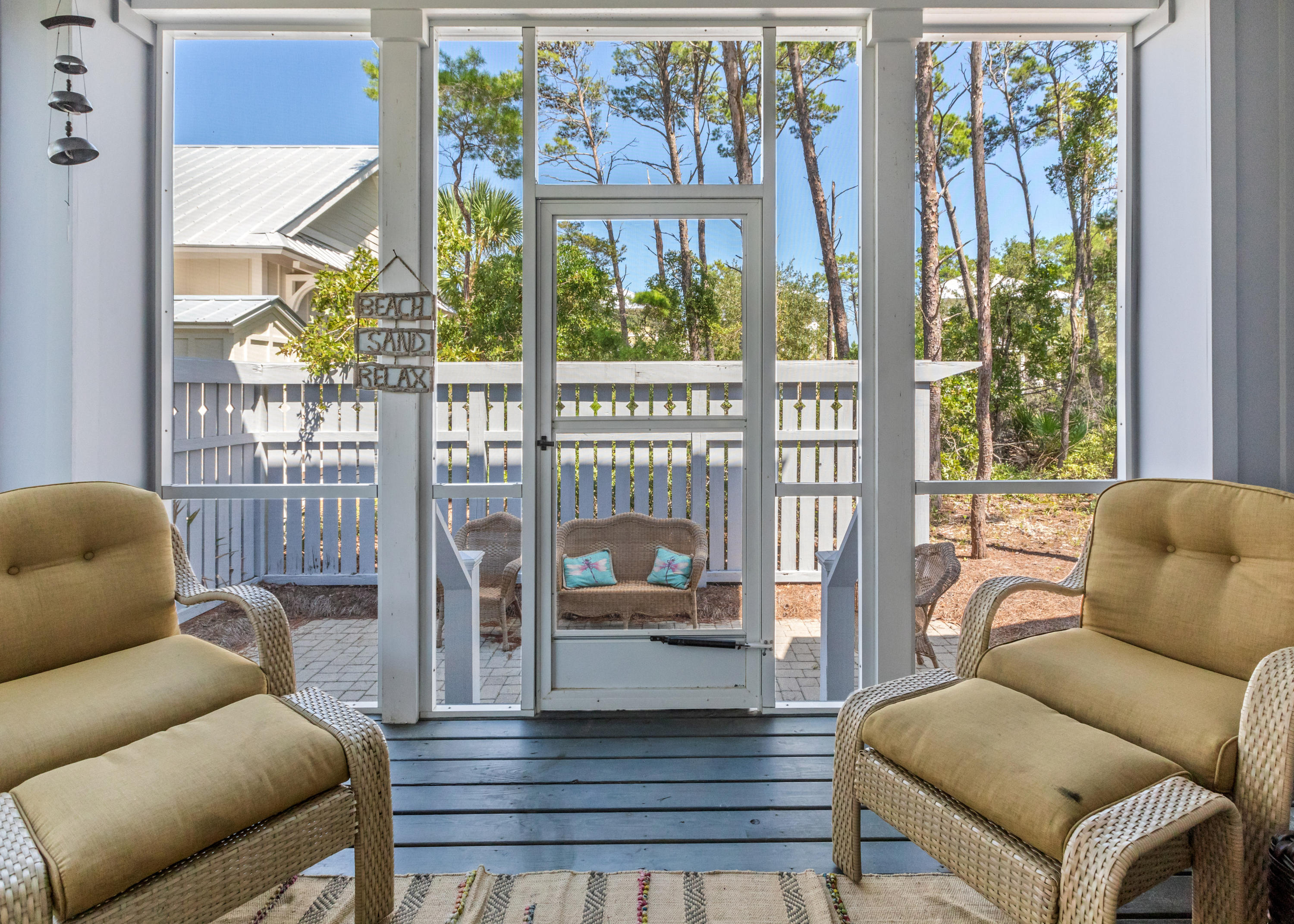 18 Hiker Street Santa Rosa Beach, FL 32459 - Photo 17 of 39 a living room with furniture and a floor to ceiling window