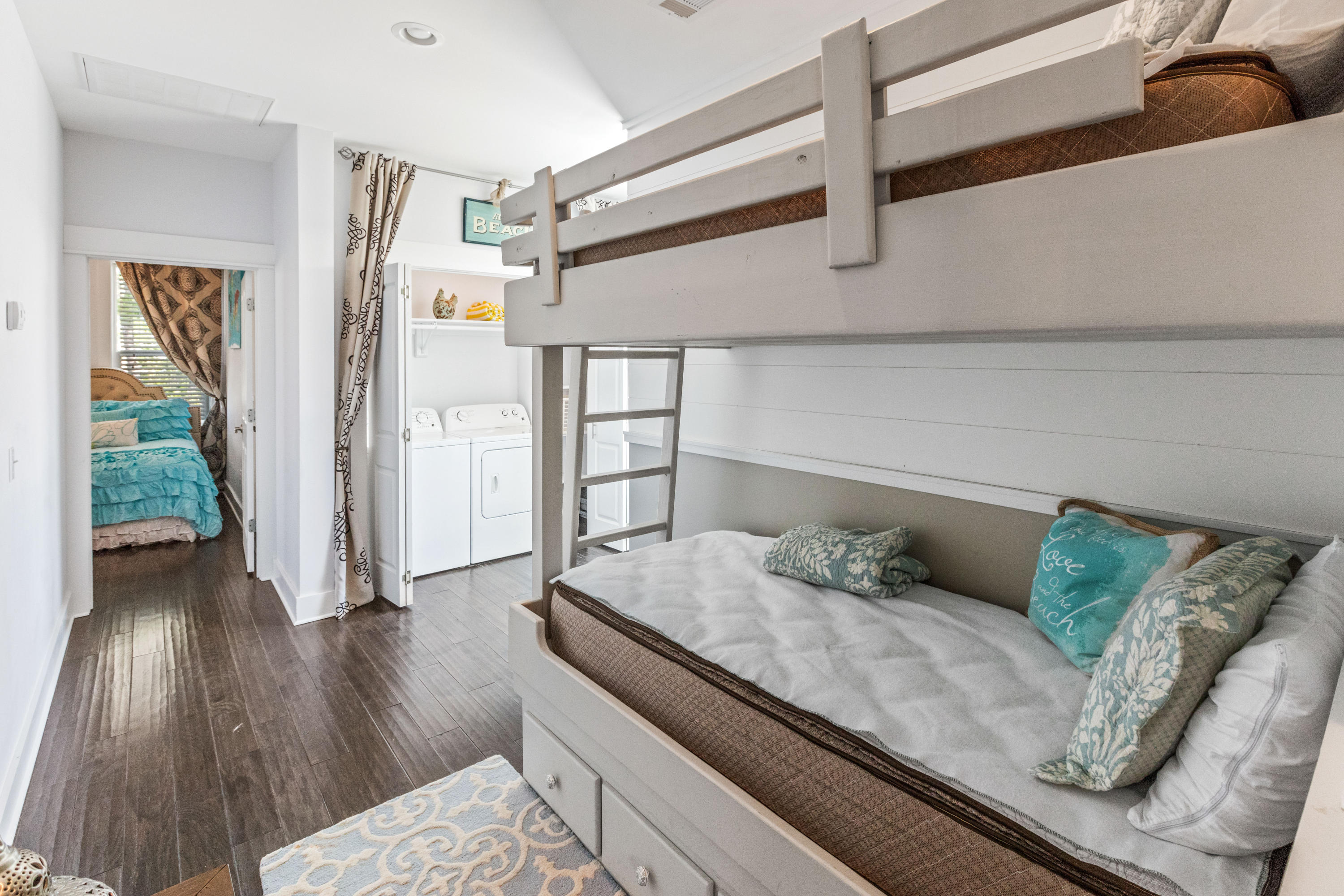 18 Hiker Street Santa Rosa Beach, FL 32459 - Photo 24 of 39 a bedroom with furniture and a wooden floor