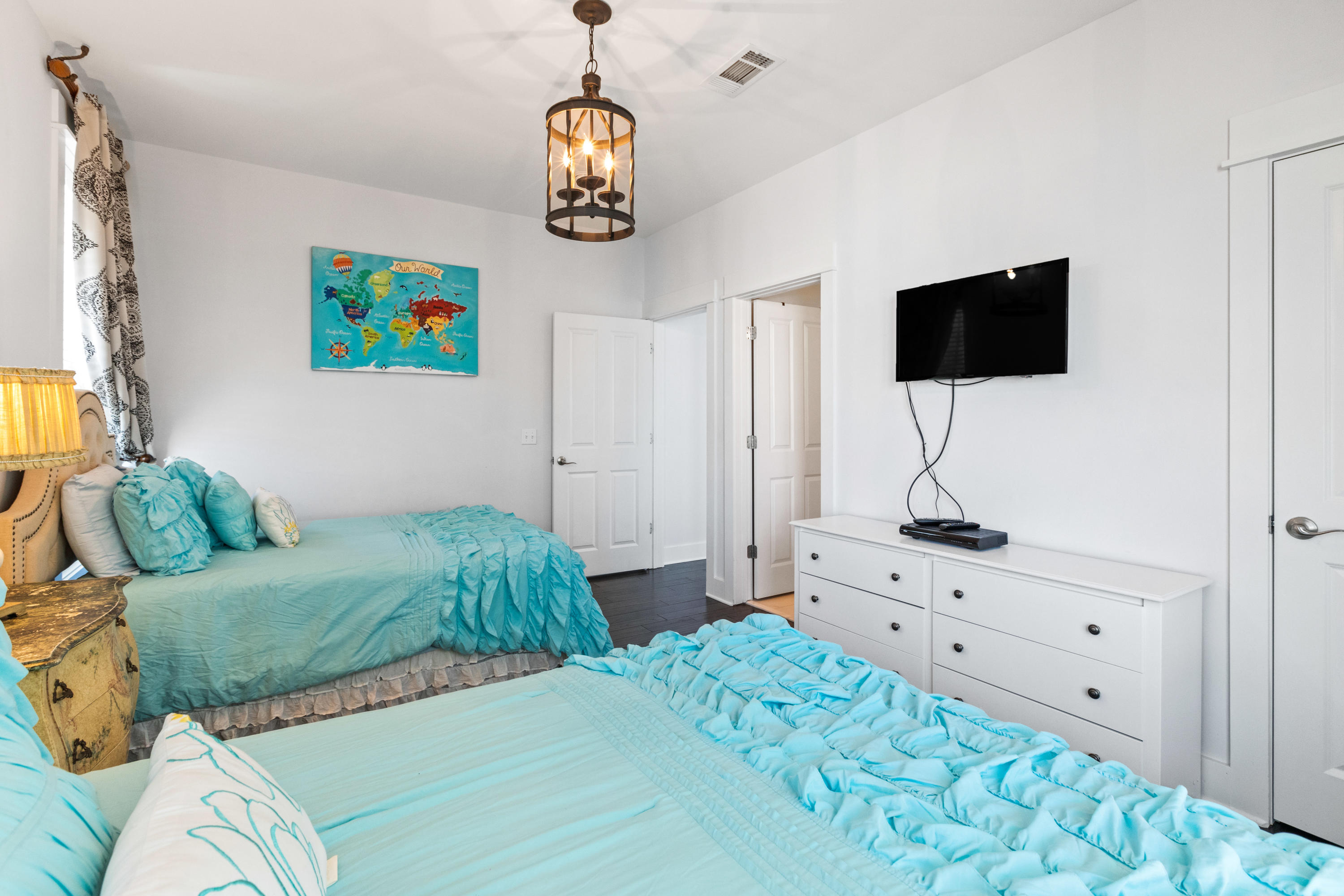 18 Hiker Street Santa Rosa Beach, FL 32459 - Photo 26 of 39 a bedroom with a bed and flat screen tv