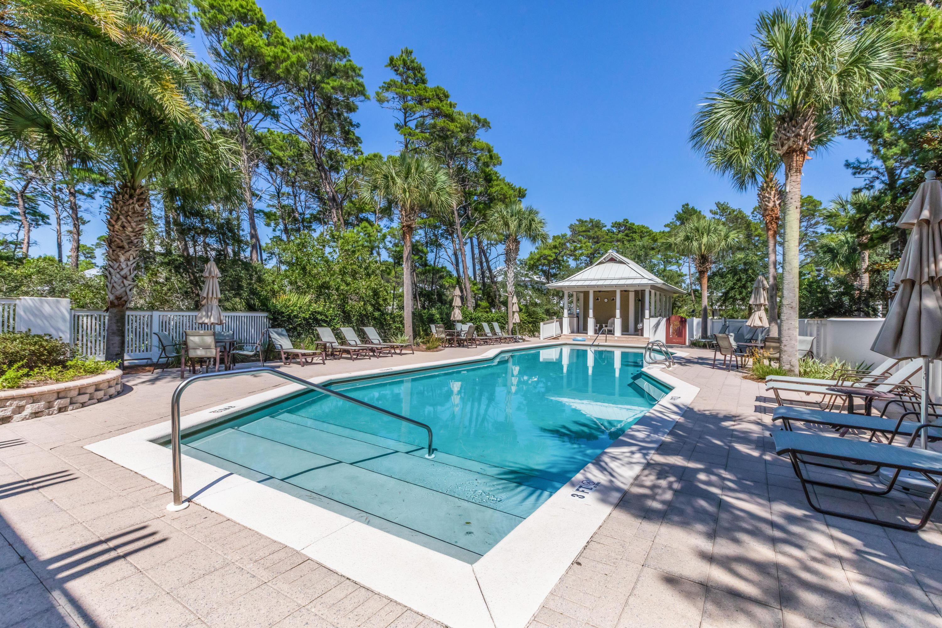 18 Hiker Street Santa Rosa Beach, FL 32459 - Photo 35 of 39 a view of a swimming pool with a lounge chairs