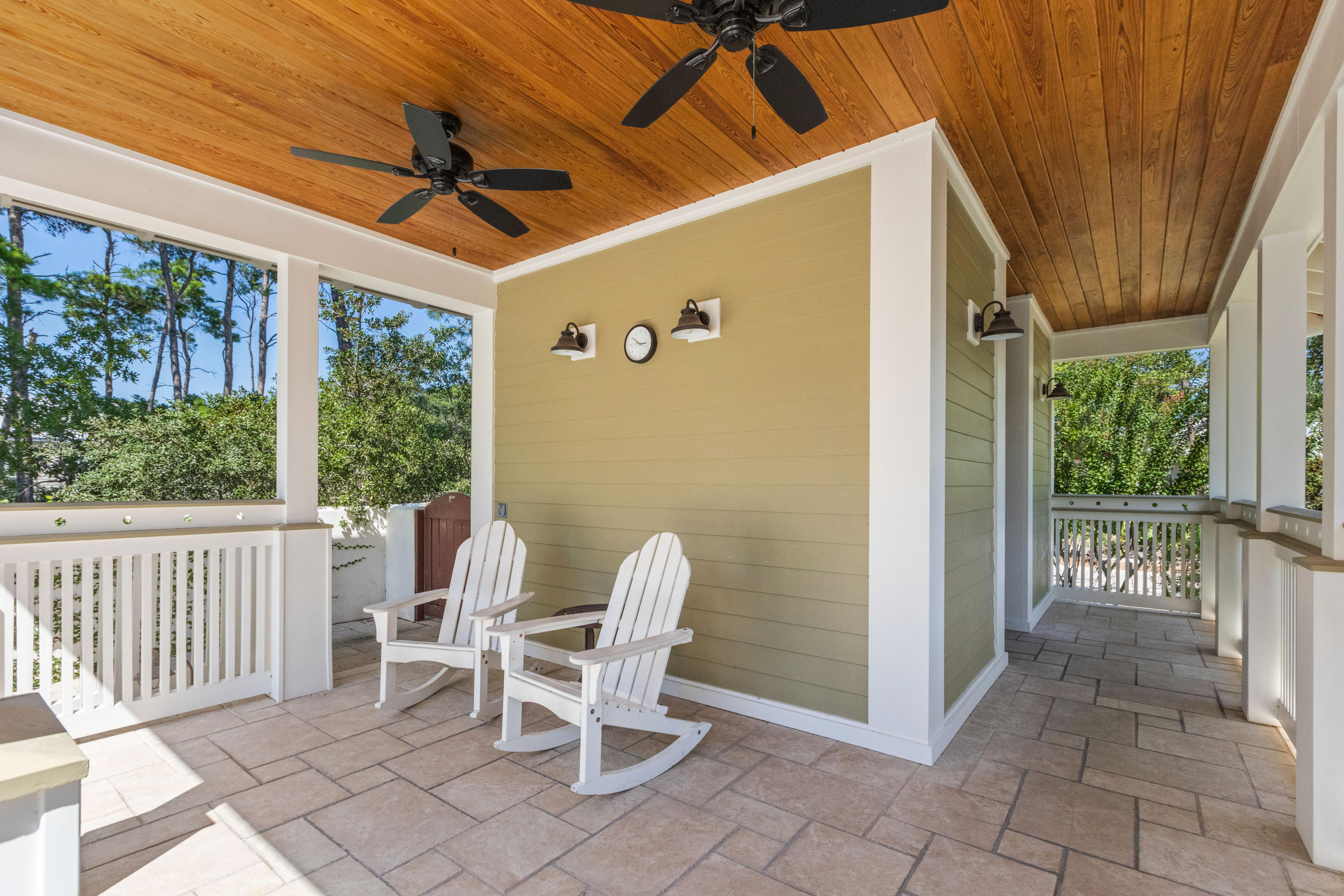 18 Hiker Street Santa Rosa Beach, FL 32459 - Photo 38 of 39 a porch with a table and chairs
