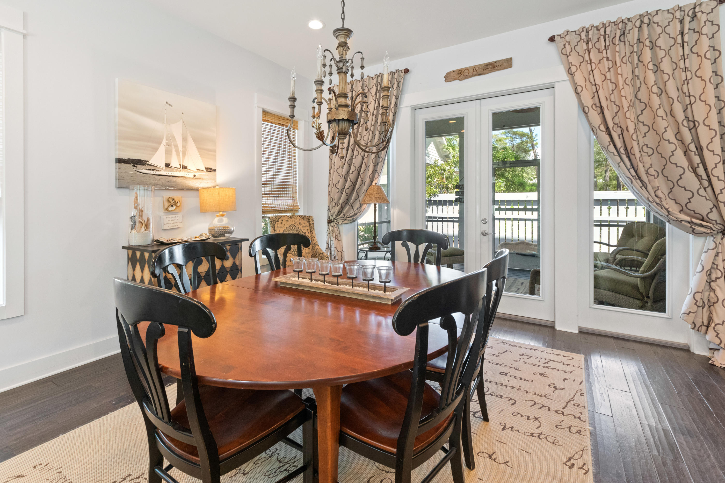 18 Hiker Street Santa Rosa Beach, FL 32459 - Photo 9 of 39 a dining room with furniture window and wooden floor