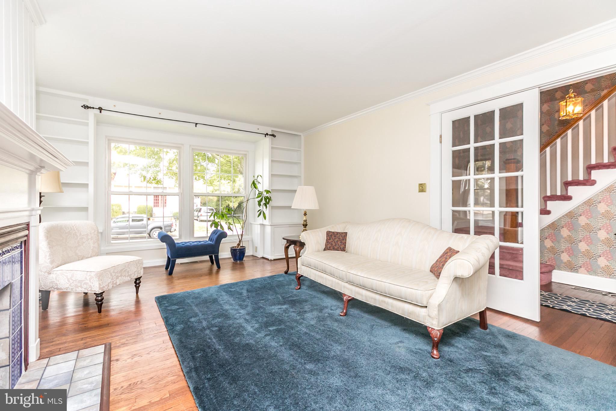 513 Anneslie Road Baltimore, MD 21212 - Photo 3 of 29 Light filled living room with french doors.