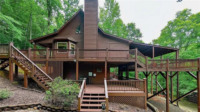 a living room with furniture and windows