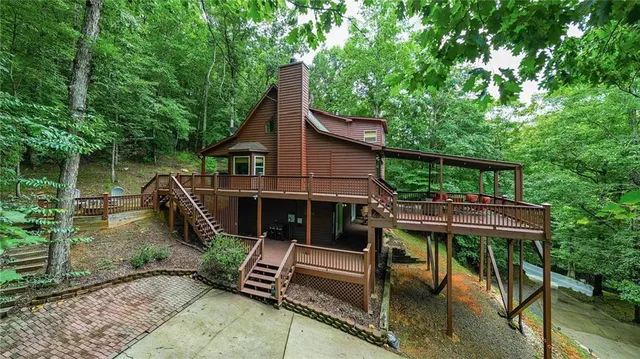 a view of backyard with green space