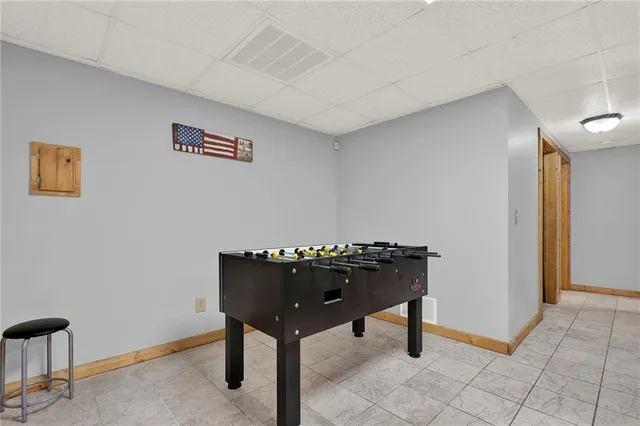 a view of chairs on wooden deck