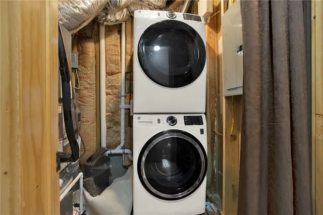 a view of a porch with wooden floor and fence