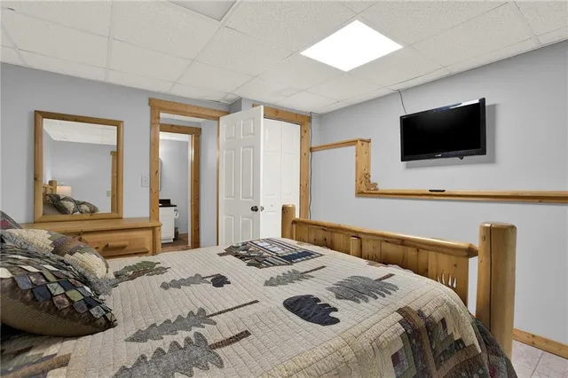 a front view of a house with a yard table and chairs