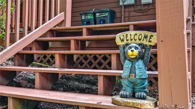 a view of a deck with wooden floor and outdoor space