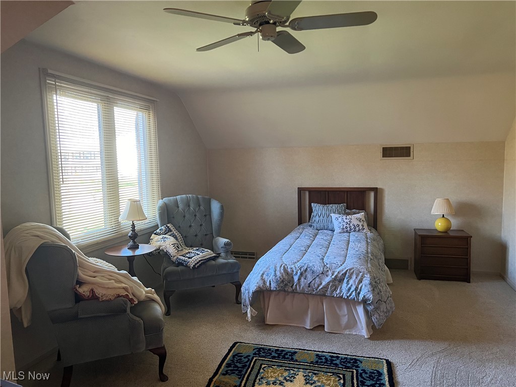 3330 Stanley Road Akron, OH 44333 - Photo 20 of 22 Bedroom featuring carpet flooring, vaulted ceiling, and ceiling fan