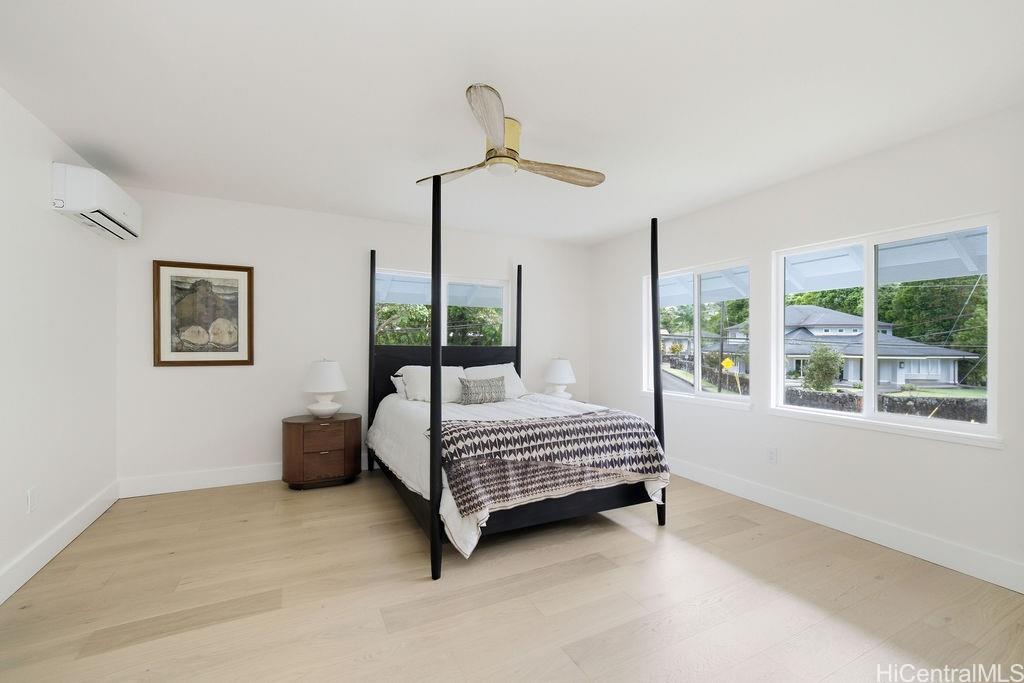 3198 Alika Avenue Honolulu, HI 96817 - Photo 16 of 25 a room with a bed and a window