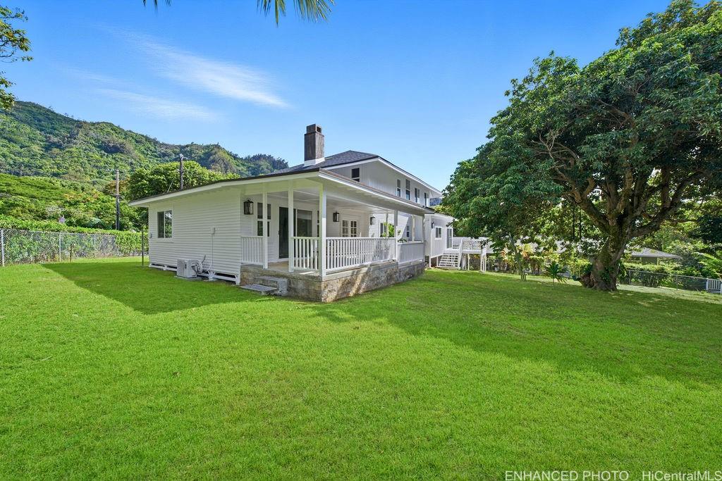 3198 Alika Avenue Honolulu, HI 96817 - Photo 24 of 25 a front view of a house with garden
