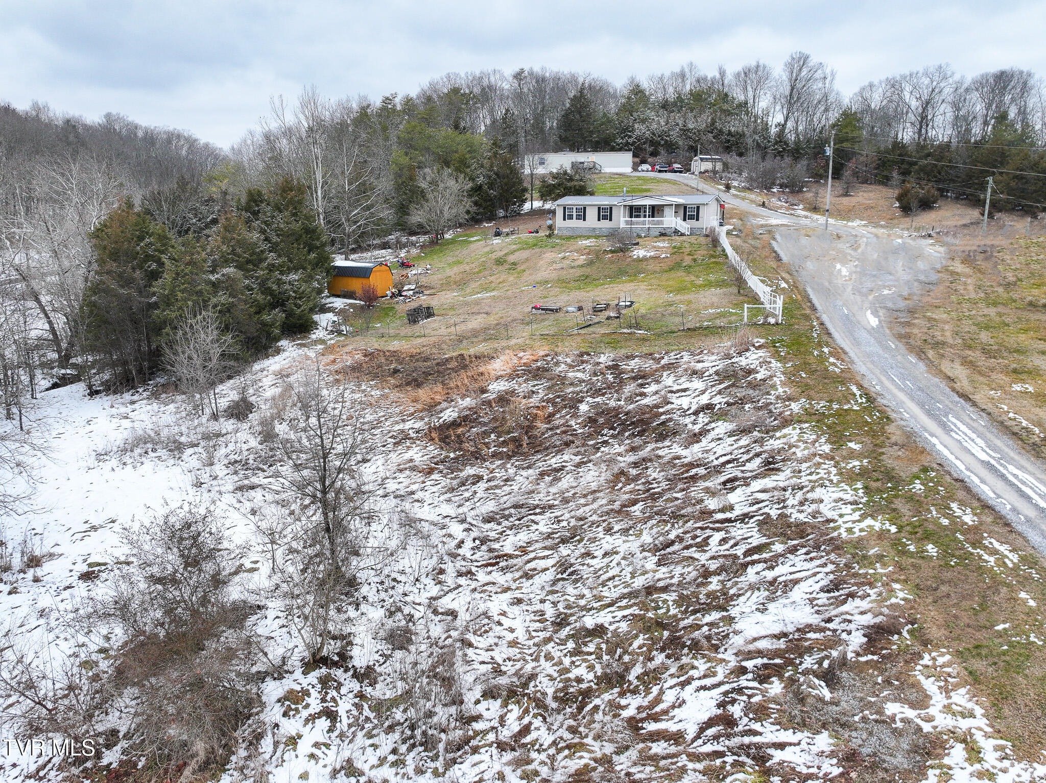 721 Old Midway Road Midway, TN 37809 - Photo 2 of 51 DJI_20260205152026_0110_D-Edit