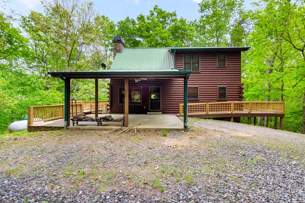 4834 Squirrel Hunting Road Morganton, GA 30560 - Photo 2 of 48 a view of a house with a yard and wooden fence