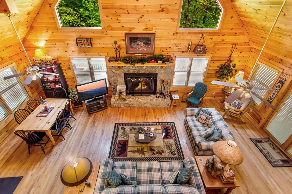 4834 Squirrel Hunting Road Morganton, GA 30560 - Photo 36 of 48 an aerial view of a fireplace with table and chairs