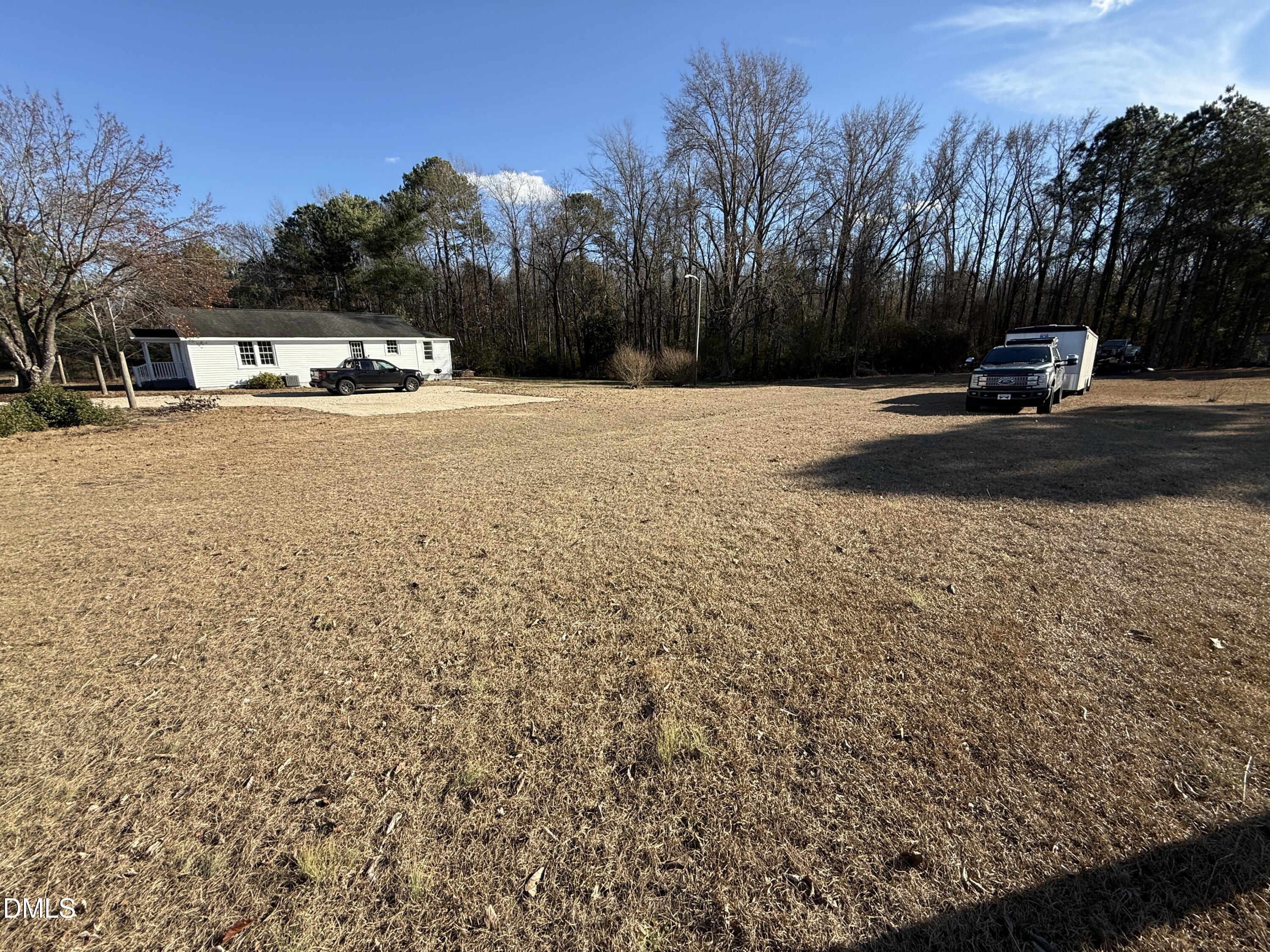 895 Stewart Road Four Oaks, NC 27524 - Photo 29 of 38 a view of road with trees