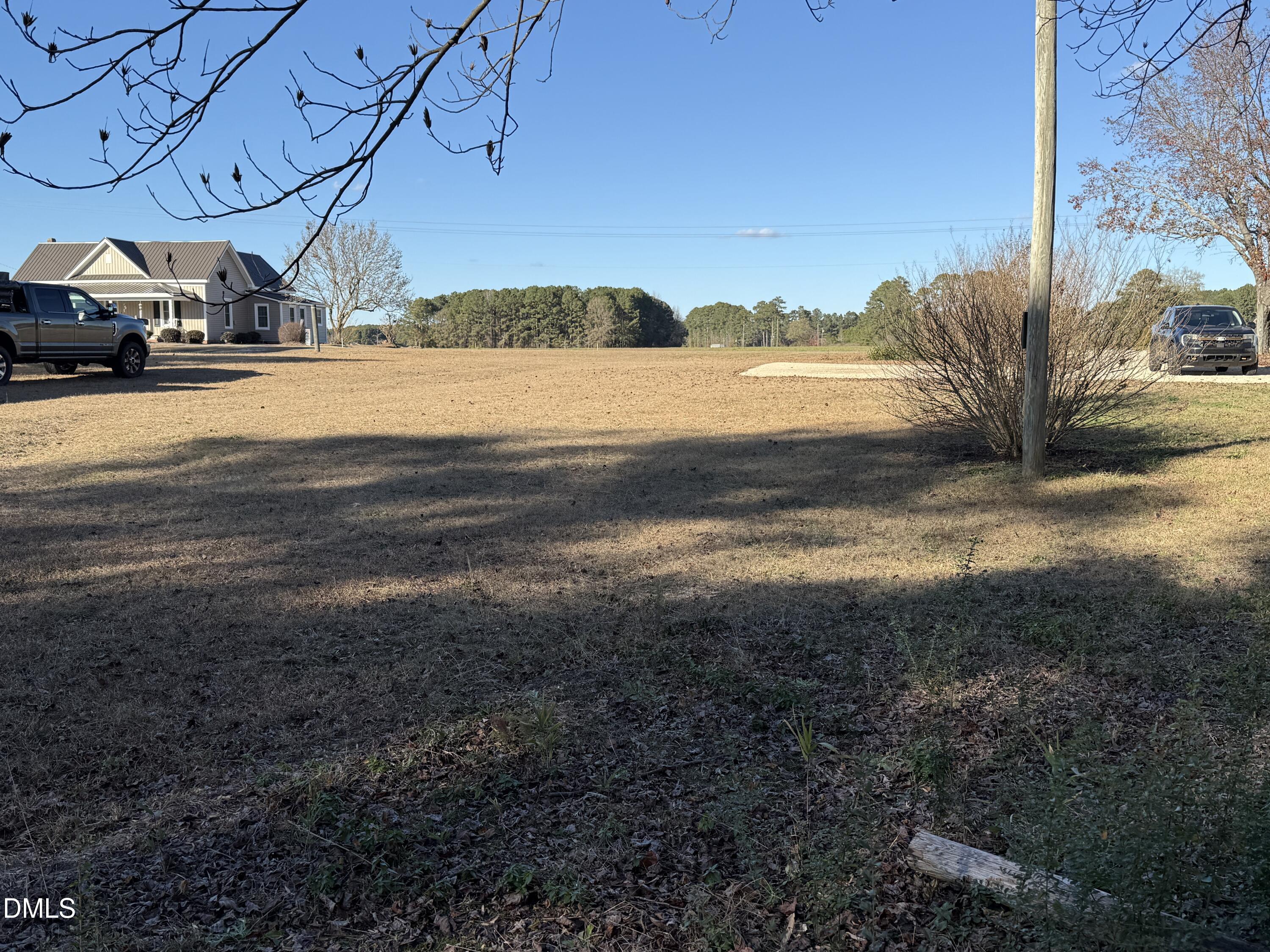 895 Stewart Road Four Oaks, NC 27524 - Photo 32 of 38 a view of a road with an ocean view