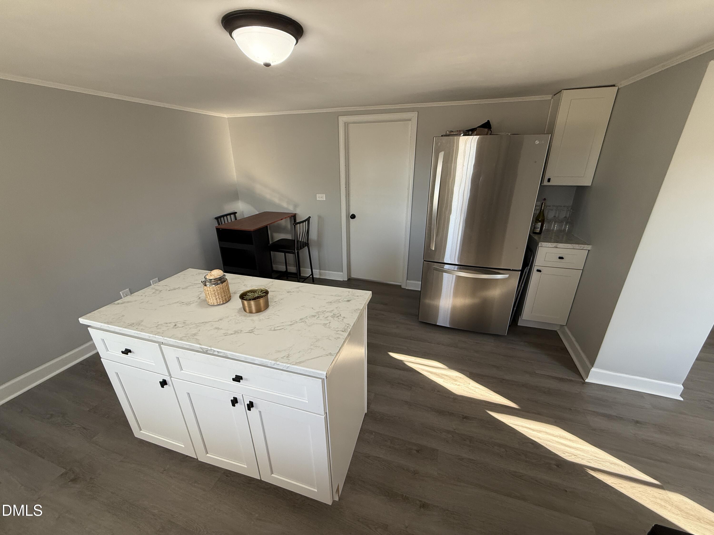 895 Stewart Road Four Oaks, NC 27524 - Photo 9 of 38 a kitchen with a appliances