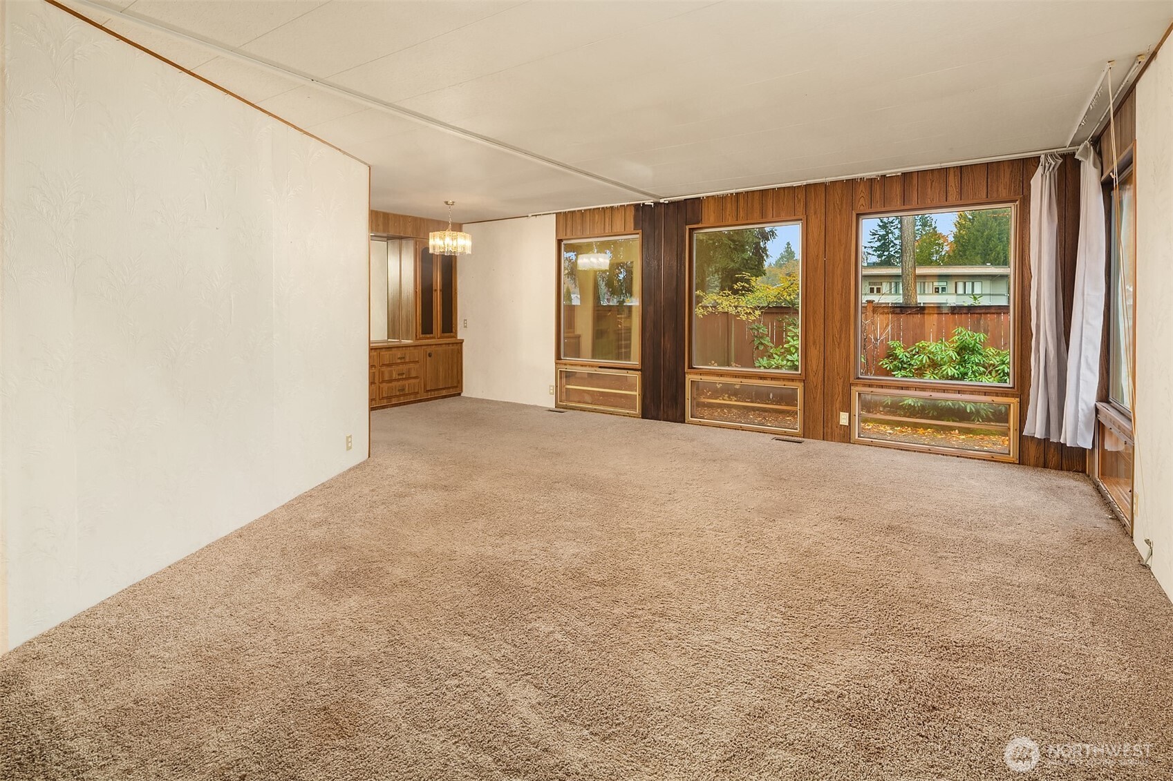 12800 Northeast 190th Place Bothell, WA 98011 - Photo 12 of 22 a view of empty room with floor to ceiling window