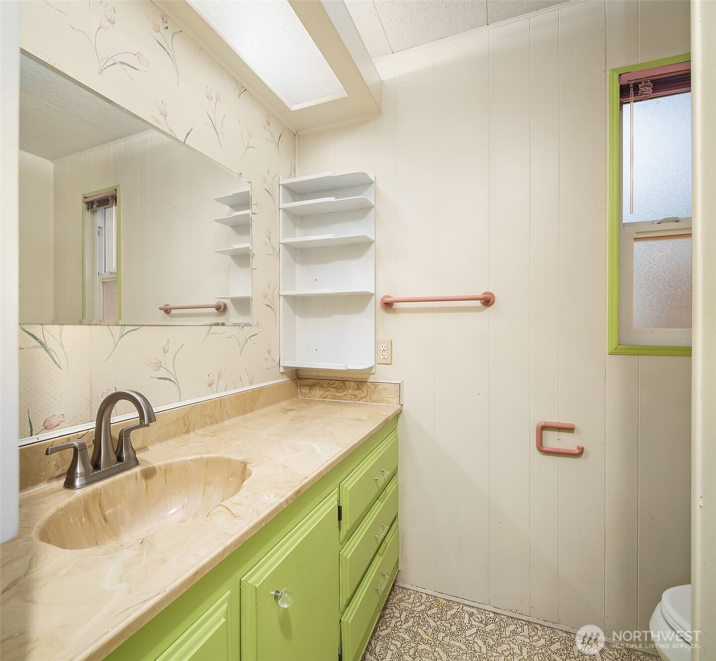 12800 Northeast 190th Place Bothell, WA 98011 - Photo 15 of 22 a bathroom with a sink and a mirror