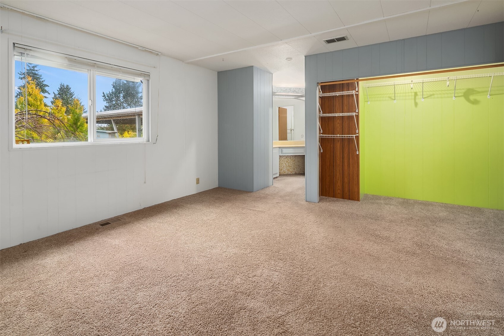 12800 Northeast 190th Place Bothell, WA 98011 - Photo 6 of 22 a view of an empty room with a window