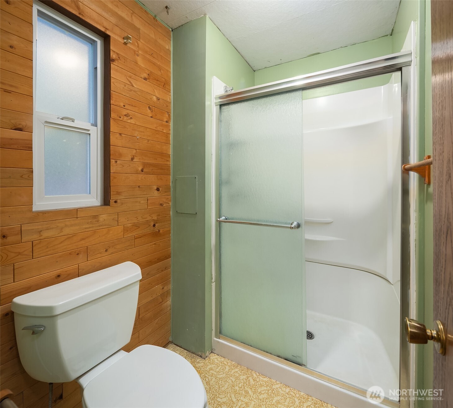 12800 Northeast 190th Place Bothell, WA 98011 - Photo 9 of 22 a bathroom with a toilet and a shower