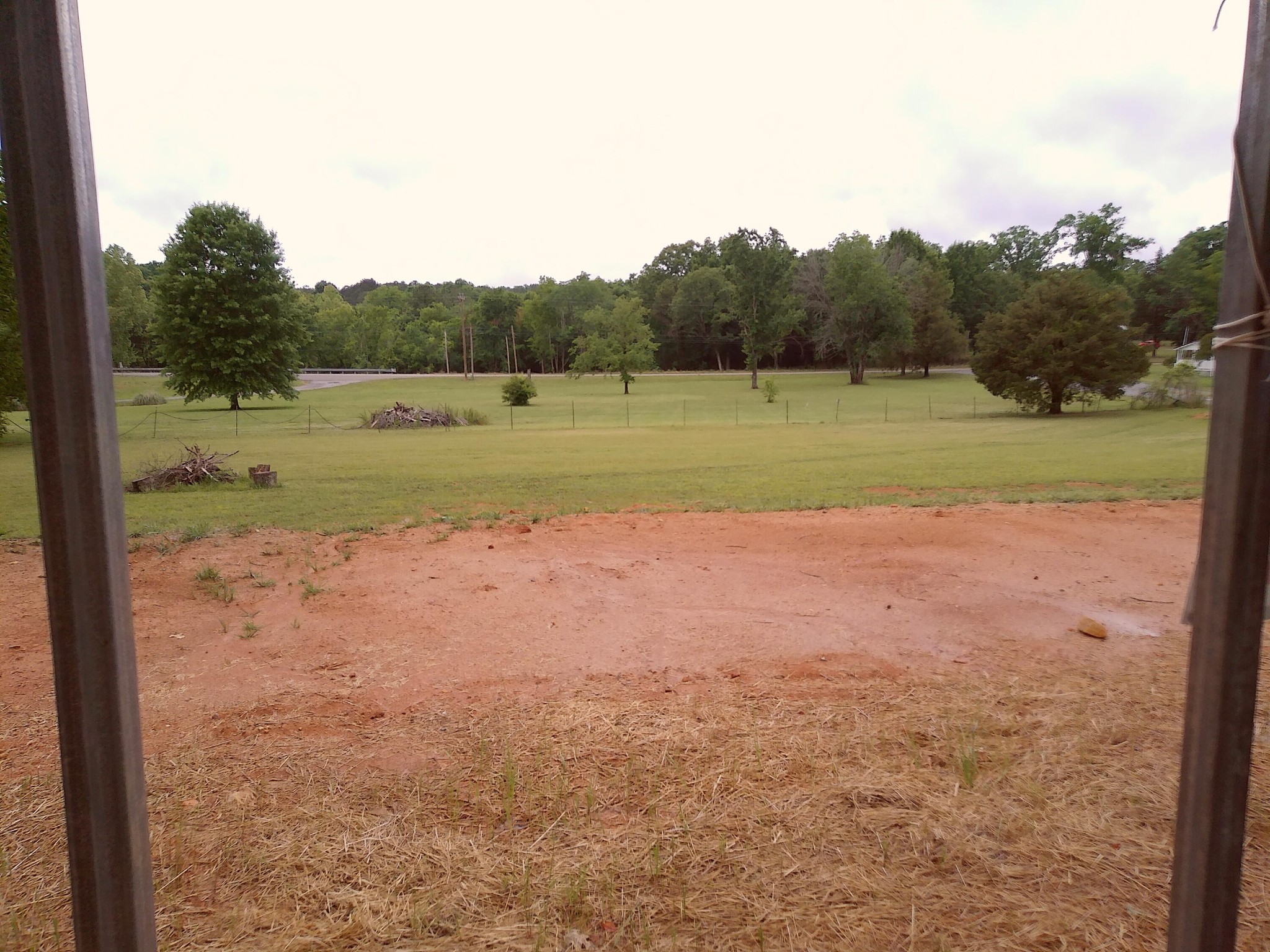 5668 Tennessee 58 Decatur, TN 37322 - Photo 21 of 24 a view of a field with trees in background
