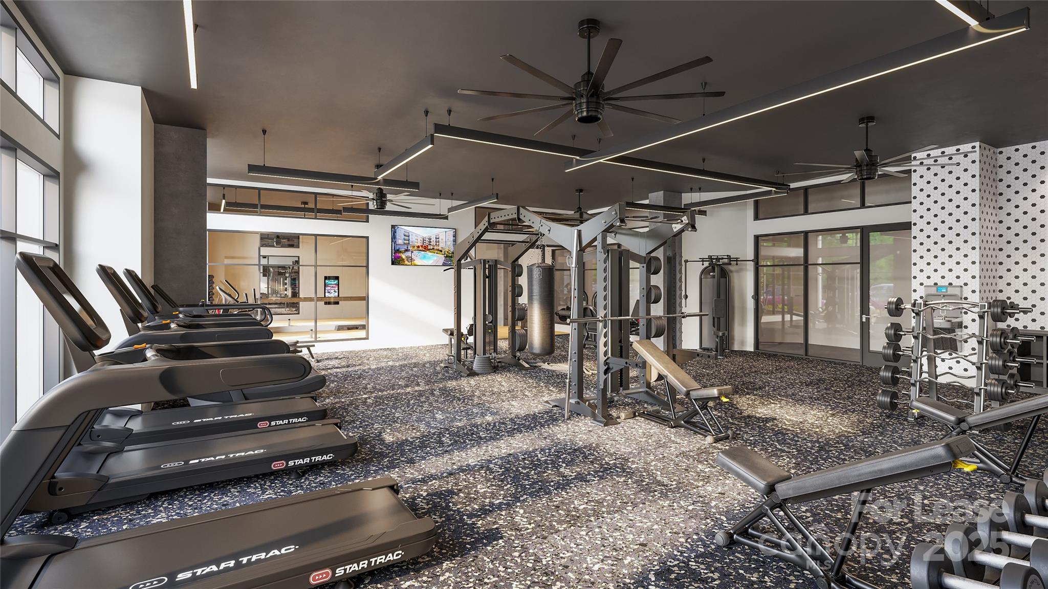5701 Central Avenue, Unit A1 Charlotte, NC 28212 - Photo 3 of 7 a room with gym equipment