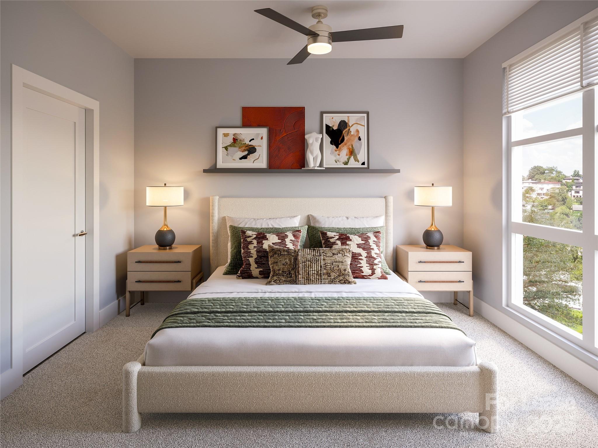 5701 Central Avenue, Unit A1 Charlotte, NC 28212 - Photo 6 of 7 a bedroom with a bed and glass window