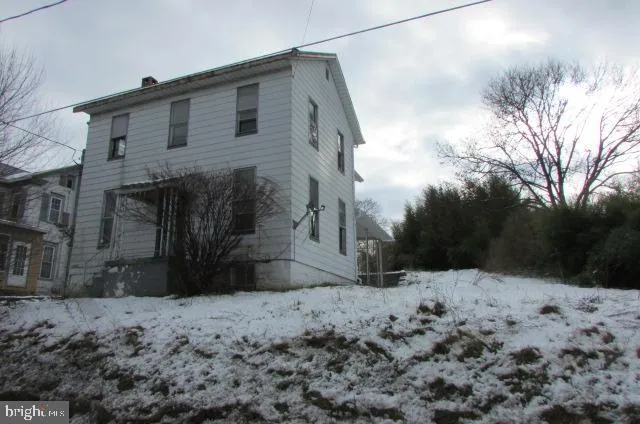 a view of a covered with snow in the yard