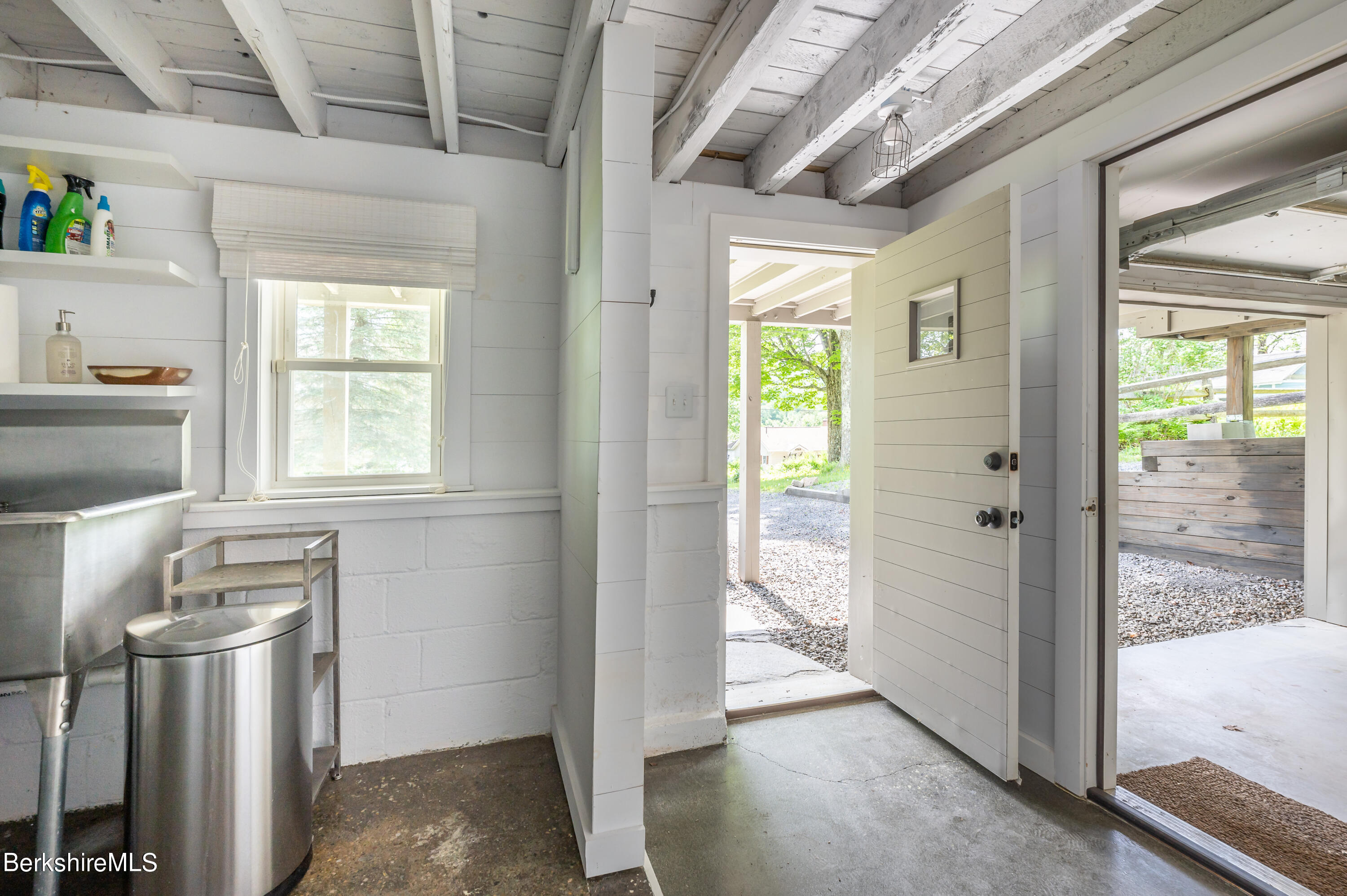 219 Shore Road Richmond, MA 01201 - Photo 16 of 28 a view of a storage & utility room with a window