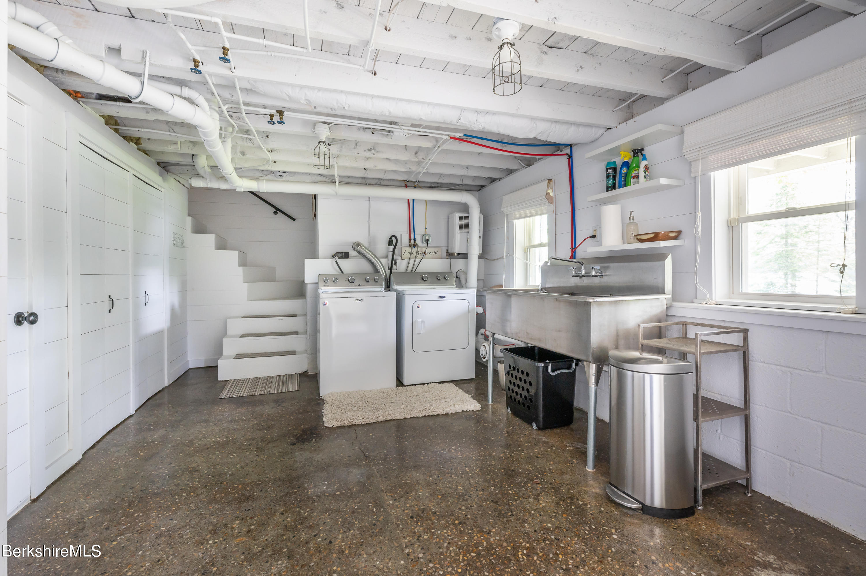 219 Shore Road Richmond, MA 01201 - Photo 17 of 28 a kitchen with stainless steel appliances granite countertop a stove and a refrigerator