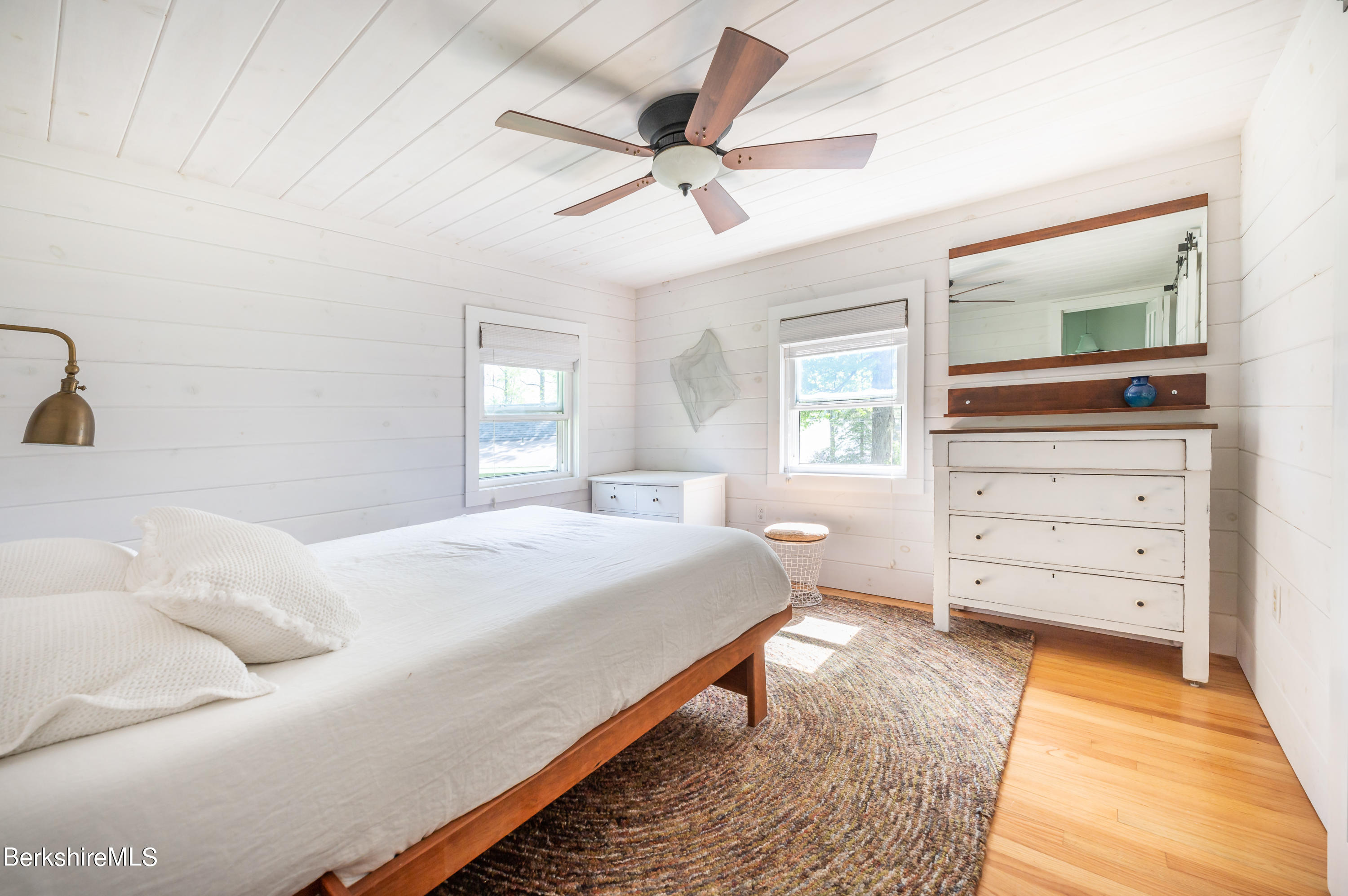 219 Shore Road Richmond, MA 01201 - Photo 10 of 28 a bedroom with a bed and a dresser