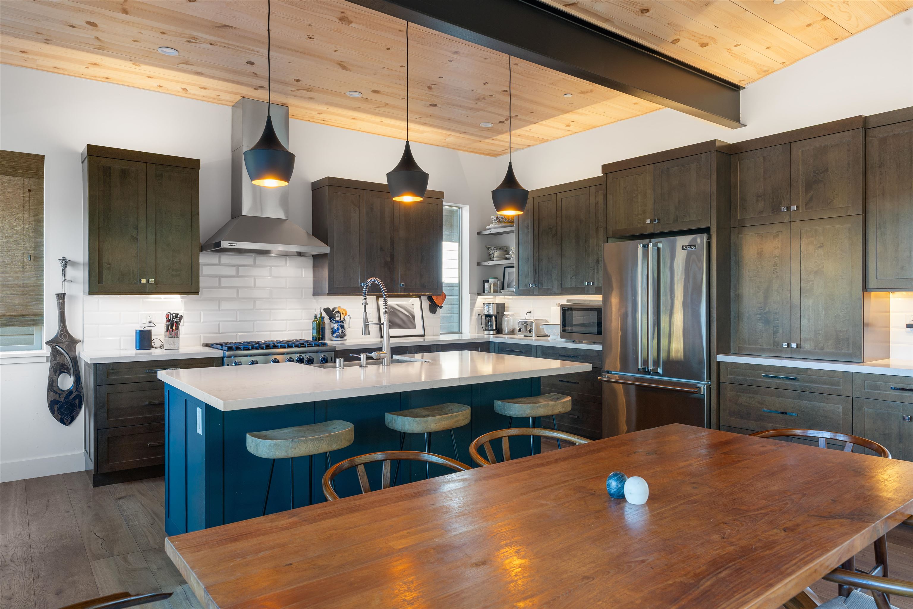 11658 McClintock Loop Truckee, CA 96161 - Photo 11 of 13 a kitchen with stainless steel appliances granite countertop a sink refrigerator and cabinets