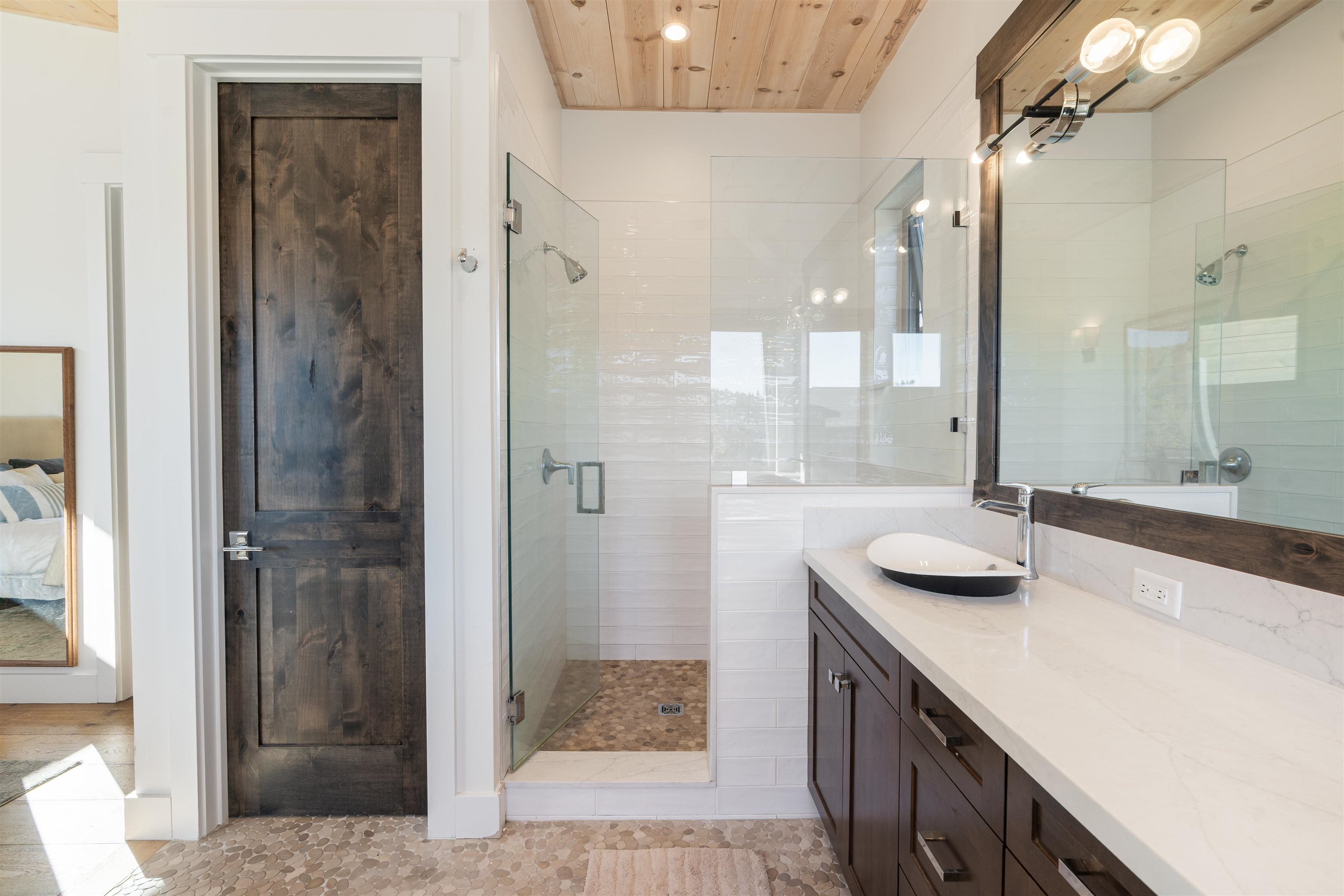 11658 McClintock Loop Truckee, CA 96161 - Photo 3 of 13 a bathroom with a sink and a mirror