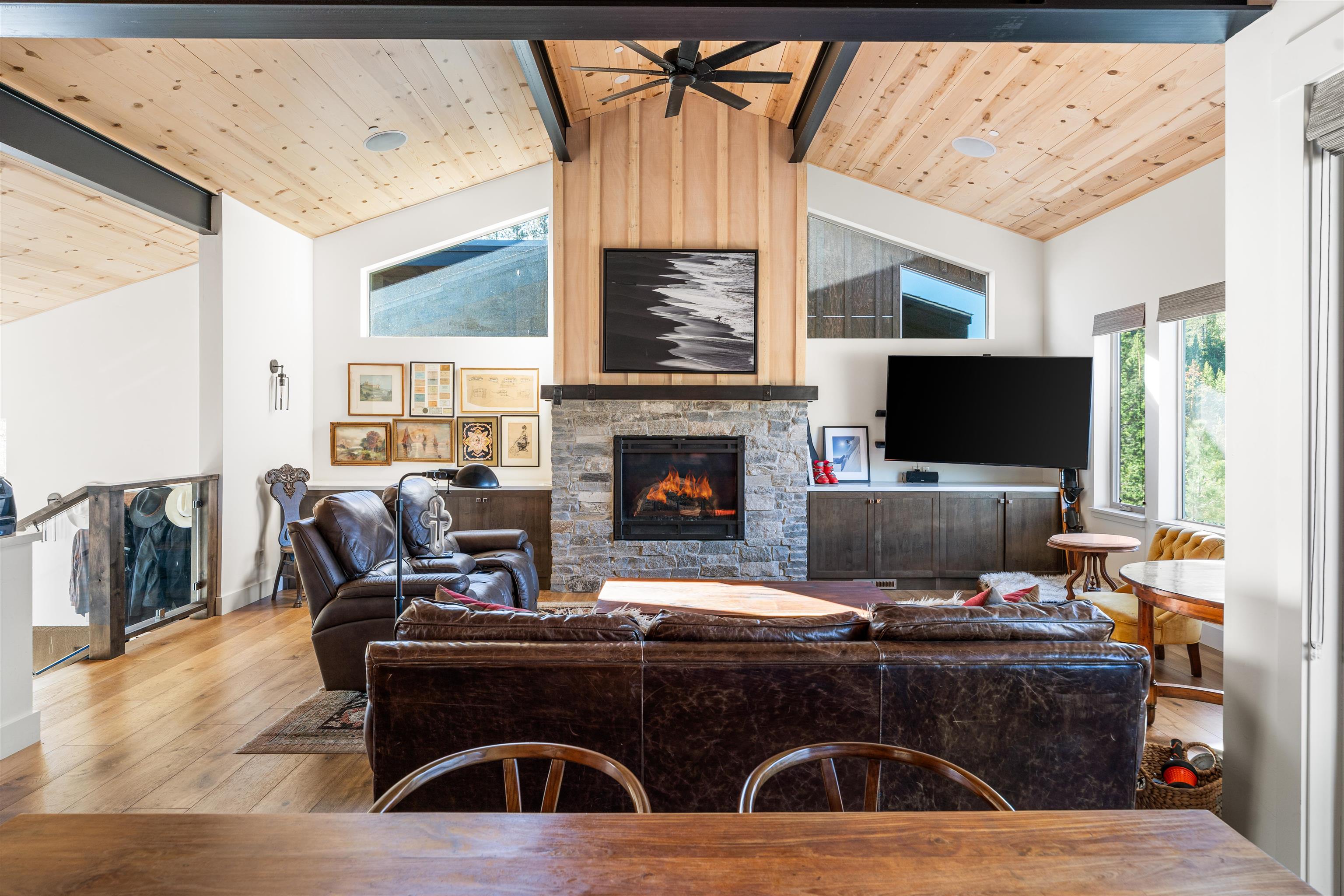 11658 McClintock Loop Truckee, CA 96161 - Photo 4 of 13 a living room with furniture a flat screen tv and a fireplace