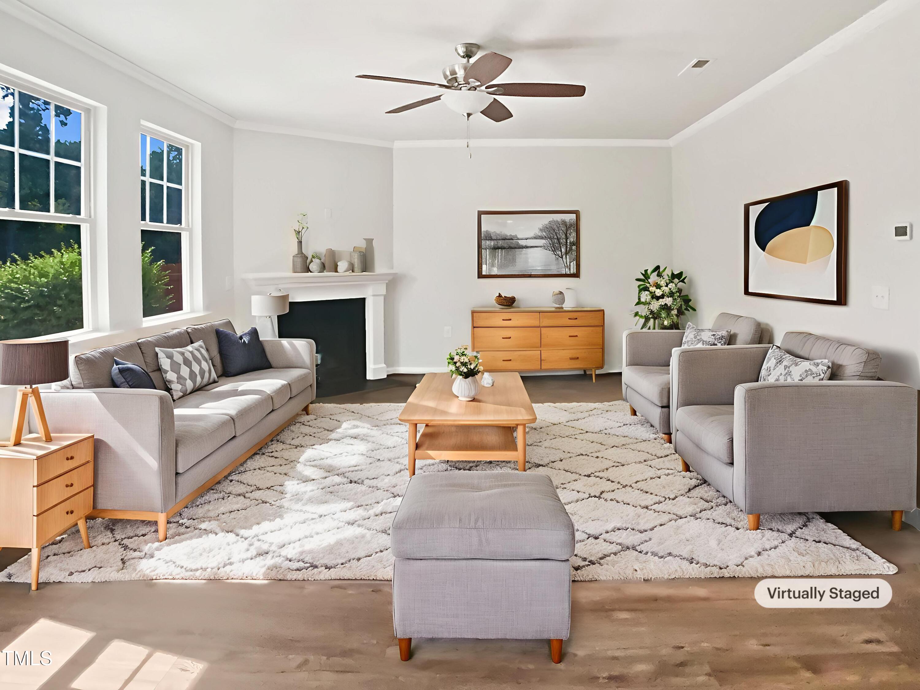 617 Hiddenbrook Drive Durham, NC 27703 - Photo 4 of 26 a living room with furniture and a fireplace