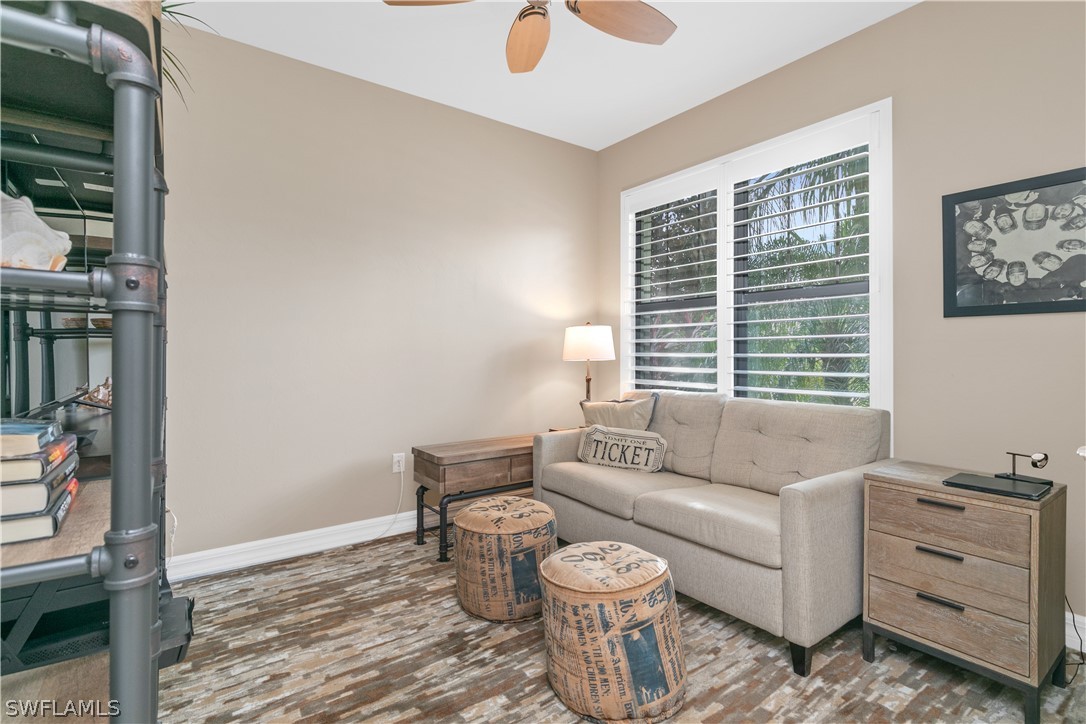 10832 Dennington Road Fort Myers, FL 33913 - Photo 18 of 34 a living room with furniture and a window